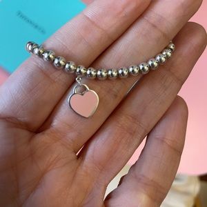 Tiffany bracelet with pink heart charm